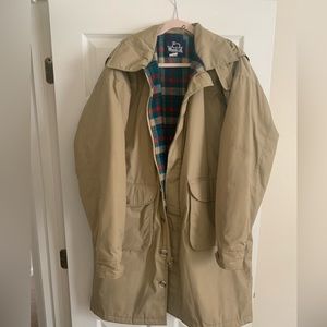 Woolrich men’s large multi-pocket coat. Camel colored and wool lined